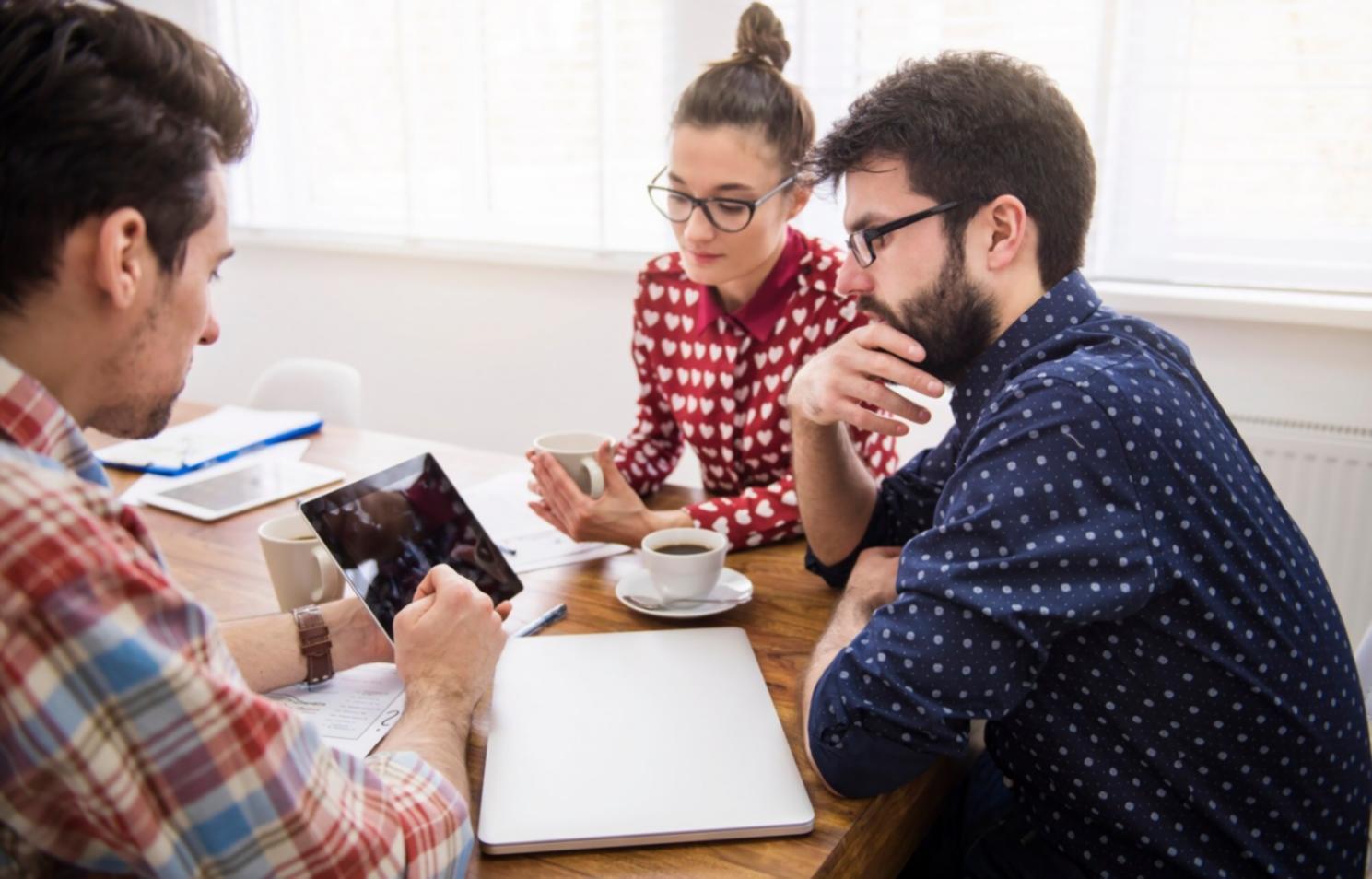 Professional financial consultation session showing collaborative budget planning